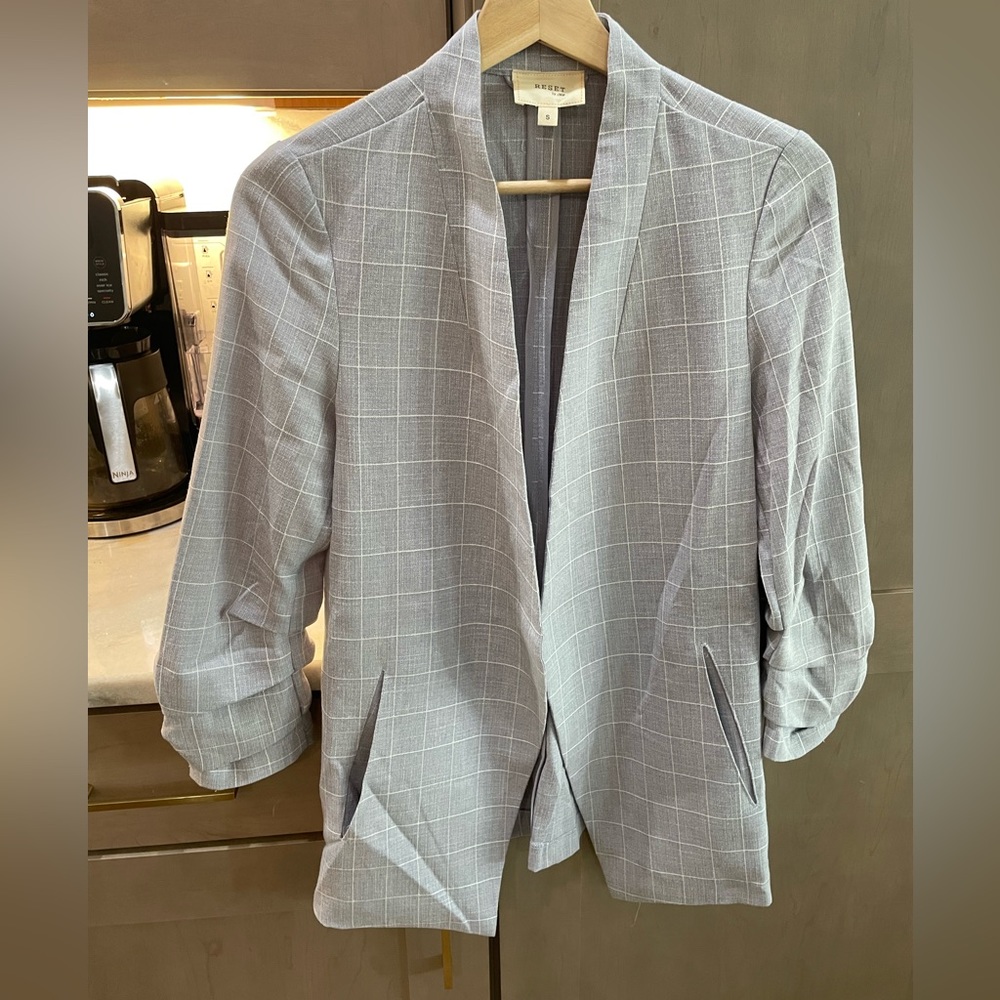 Grey blazer with white stripes